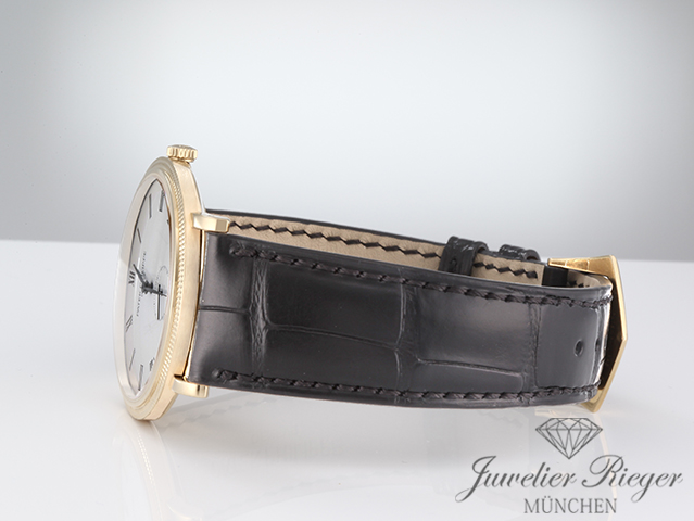 Image 6 of gallery: Patek Philippe Calatrava 5119J-001 2014 Gelbgold 750 Handaufzug Gold