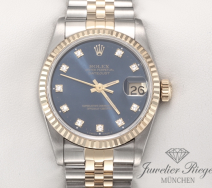 Front view of the watch, mainly showing the dial and bezel. Rolex Medium Datejust Stahl Gelbgold 750 Diamanten Automatik Gold Stahl Damen