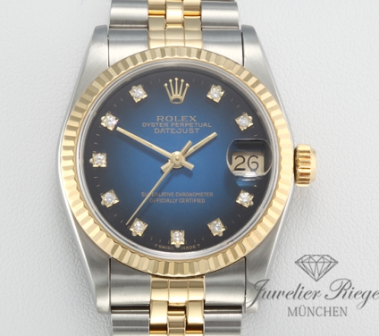 Front view of the watch, mainly showing the dial and bezel. Rolex Medium Datejust 31 mm 68273 Stahl Gelbgold 750 Diamanten Automatik