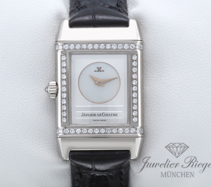 Uhransicht von vorne, hauptsächlich das Zifferblatt und die Lünette sichtbar. Jaeger Le Coultre Reverso Duetto Lady Weissgold 750 266.3.44 Diamanten Gold