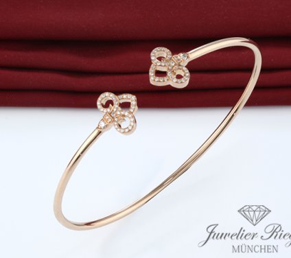 . Tiffany & Co. Armreif Keys Fleur de Lis Rosegold 750 Gr Medium Diamanten 0,12 ct