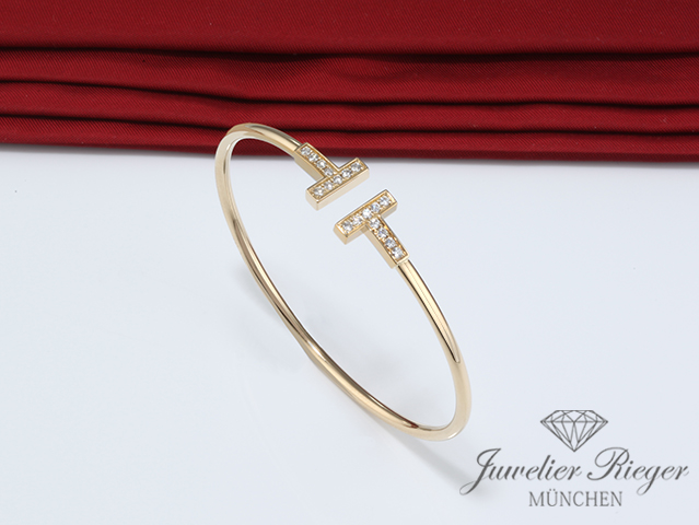 Bild 1 der Galerie: Tiffany & Co. T Wire Armreif Gelbgold 750 Größe Small Diamanten Brillanten