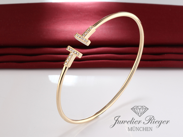 Bild 2 der Galerie: Tiffany & Co. T Wire Armreif Gelbgold 750 Größe Small Diamanten Brillanten